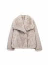 Adele faux fur oversized coat in plush synthetic fibres with wide lapel collar, concealed front and relaxed silhouette. Warm, durable and cruelty-free outerwear that layers over jeans, dresses and evening looks for chic winter style.