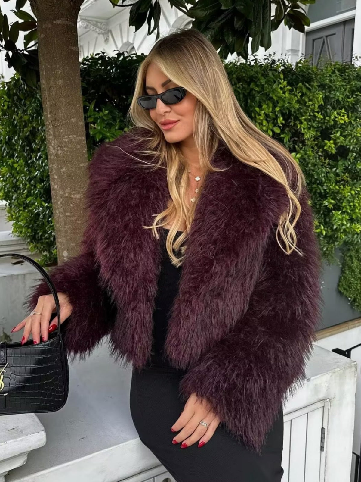 Adele faux fur oversized coat in plush synthetic fibres with wide lapel collar, concealed front and relaxed silhouette. Warm, durable and cruelty-free outerwear that layers over jeans, dresses and evening looks for chic winter style.