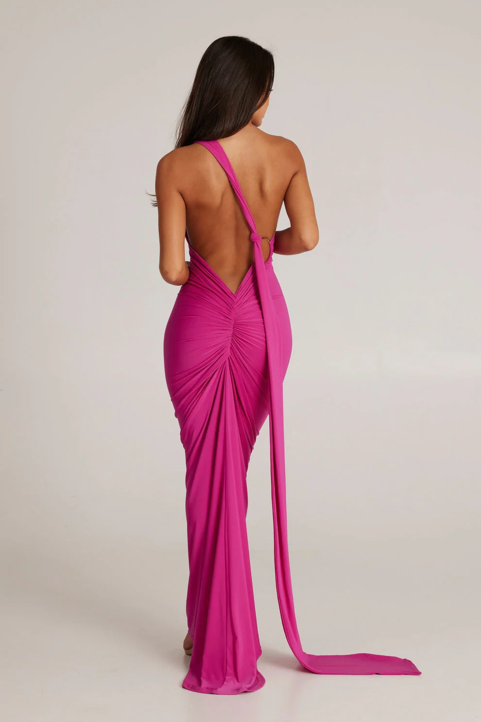 Abby backless maxi dress featuring a one-shoulder neckline, floor-length silhouette, subtle side slit and fluid drape. Stretch fabric molds to the body with a soft lining for coverage. Cotton, polyester, elastane blend—ideal for formal events.