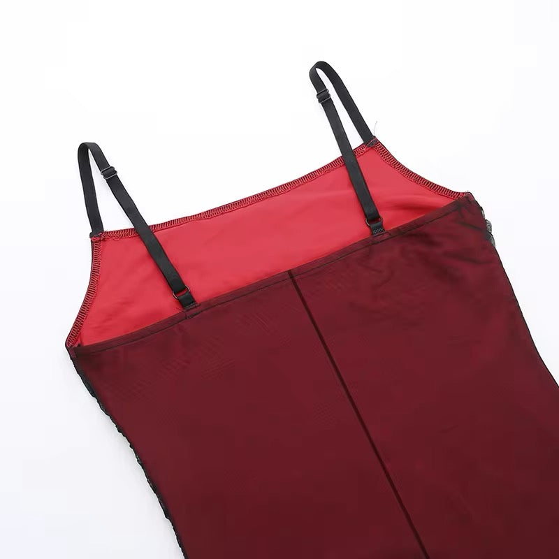 Adriana Tulle Maxi Dress featuring a sleek, floor-grazing silhouette with soft drape that defines the waist and flatters the hips. Stretch tulle in a cotton, polyester and elastane blend adapts to the body for smooth, elegant evening wear.