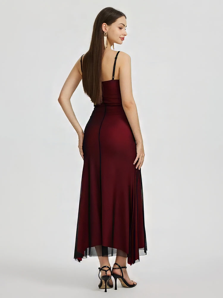 Adriana Tulle Maxi Dress featuring a sleek, floor-grazing silhouette with soft drape that defines the waist and flatters the hips. Stretch tulle in a cotton, polyester and elastane blend adapts to the body for smooth, elegant evening wear.