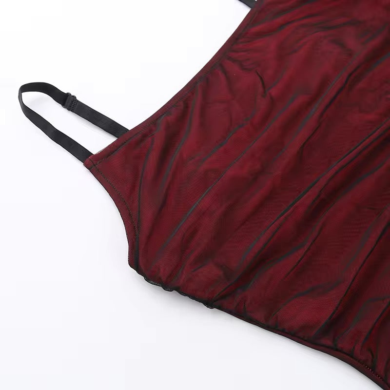 Adriana Tulle Maxi Dress featuring a sleek, floor-grazing silhouette with soft drape that defines the waist and flatters the hips. Stretch tulle in a cotton, polyester and elastane blend adapts to the body for smooth, elegant evening wear.