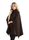 Alannah dark brown knit poncho cape featuring a refined high neckline and fluid, side-draped silhouette. Soft, medium-weight knit provides cozy warmth and effortless layering over jeans, tailored trousers or dresses for elevated everyday looks.