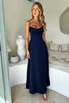 Maxi dress with delicate straps, ruched bust and lace-up back for a custom fit, finished with a flowing A-line skirt. Lightweight, breathable fabric offers graceful movement for weddings, soirées, parties or elegant daytime wear.