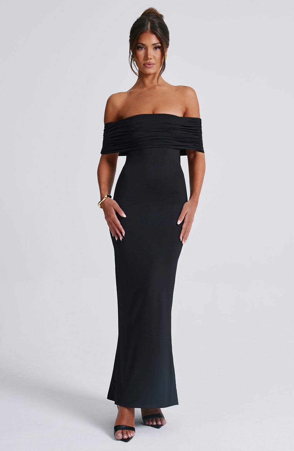 Amanda Backless Maxi Dress: off-shoulder, floor-length silhouette with V-shaped open back. Cotton, polyester and elastane blend molds to the body with a light, smoothing drape that defines the waist and flatters hip curves for elegant events.