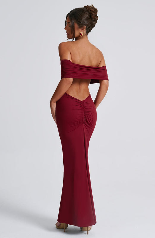 Amanda Backless Maxi Dress: off-shoulder, floor-length silhouette with V-shaped open back. Cotton, polyester and elastane blend molds to the body with a light, smoothing drape that defines the waist and flatters hip curves for elegant events.