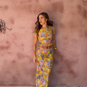 Amaris floral print two piece set featuring a short-sleeve cropped top and matching column maxi skirt in multicolor yellow, pink and grey. Body-skimming silhouette with a lightweight feel, ideal for casual days, brunch and vacations.