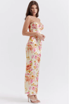 Amelia Charming Floral Maxi Dress in lightweight polyester with all-over floral print. High-waisted, figure-flattering fit with subtle pleating and spaghetti straps; elegant for garden parties, dinners, and daytime occasions.