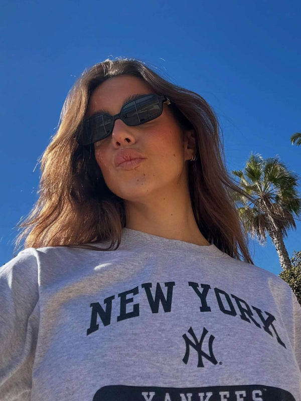 Amelia square-frame sunglasses with lightweight feel and full UV protection. Designed to flatter most face shapes and stay comfortable for daily wear. Dimensions: lenses 60×37 mm, bridge 20 mm, temples 136 mm.