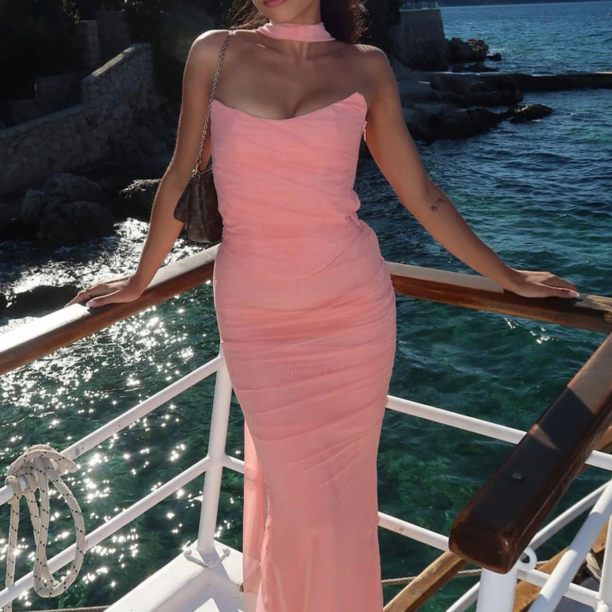 Women’s strapless bodycon maxi dress featuring a sleek, sculpting fit, clean straight neckline and floor-grazing length. Minimalist design flatters the waist and shoulders, ideal for weddings, galas or evening events paired with heels and a clutch.