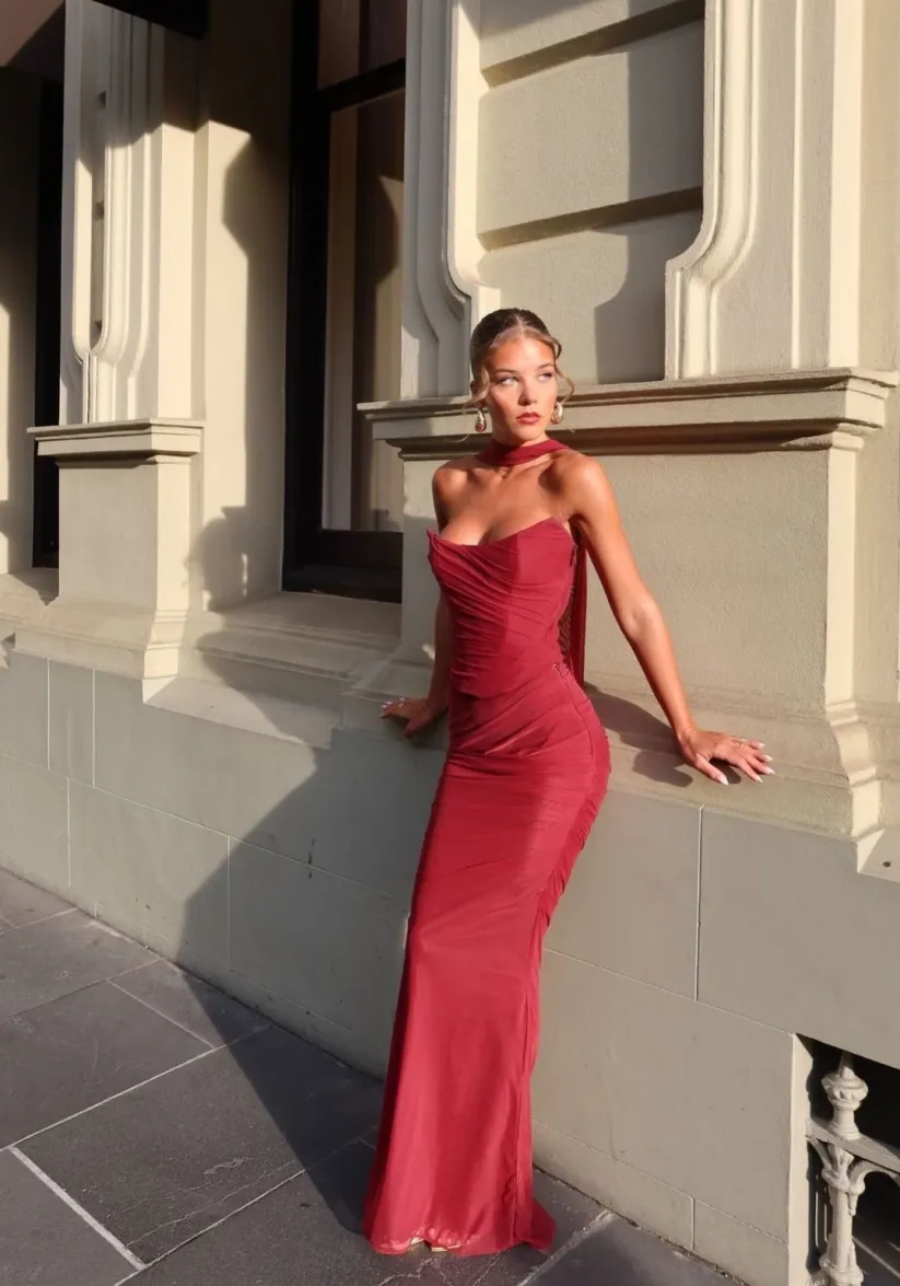 Women’s strapless bodycon maxi dress featuring a sleek, sculpting fit, clean straight neckline and floor-grazing length. Minimalist design flatters the waist and shoulders, ideal for weddings, galas or evening events paired with heels and a clutch.