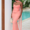 Women’s strapless bodycon maxi dress featuring a sleek, sculpting fit, clean straight neckline and floor-grazing length. Minimalist design flatters the waist and shoulders, ideal for weddings, galas or evening events paired with heels and a clutch.