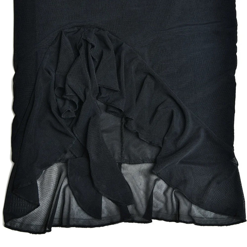 Anny Tulle Midi Dress in black featuring a body-skimming silhouette with an airy, asymmetrical sheer tulle hem. Lightweight and breathable design that flatters the waist and hips, ideal for dinners, parties and elegant summer nights.