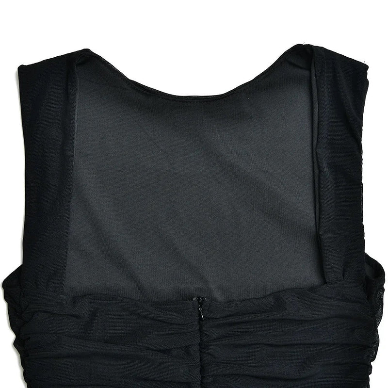 Anny Tulle Midi Dress in black featuring a body-skimming silhouette with an airy, asymmetrical sheer tulle hem. Lightweight and breathable design that flatters the waist and hips, ideal for dinners, parties and elegant summer nights.