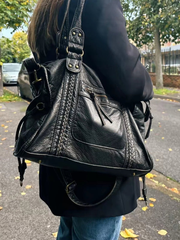 Arabell Black Shoulder Bag for Women in high-quality vegan leather; compact 25×18 cm silhouette with secure zipper/magnetic closure and shoulder/crossbody carry. Timeless, elegant design for daily wear and special occasions.