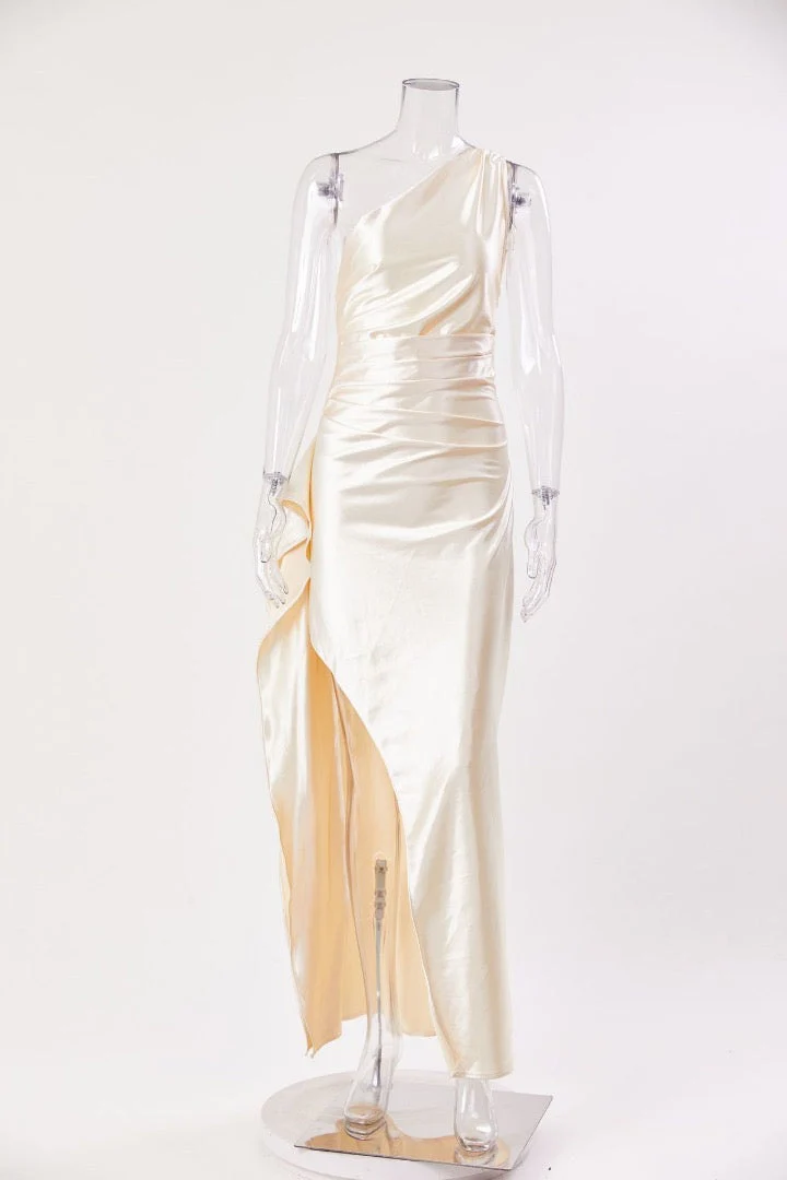 Aurora satin slit maxi dress featuring a one-shoulder neckline, backless silhouette, and fluid side slit. Made from a cotton–polyester–elastane satin blend that molds to the body with a smooth, lightweight drape for weddings, galas, and evening occasions.