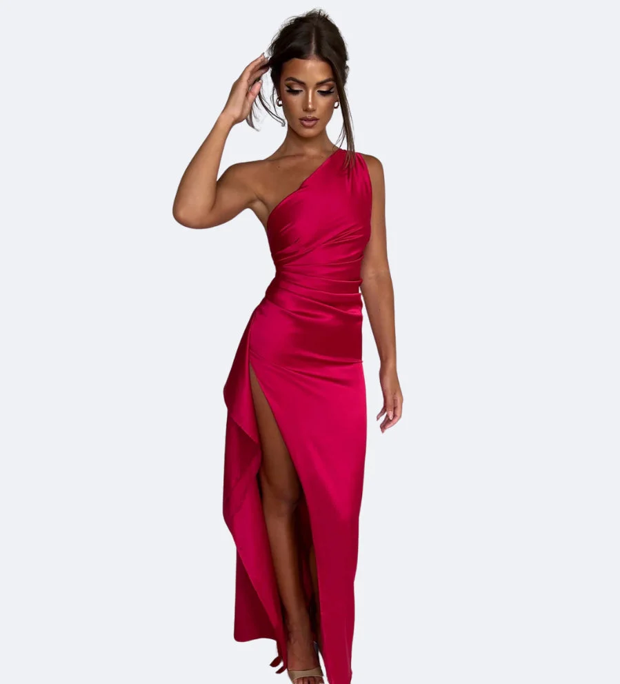 Aurora satin slit maxi dress featuring a one-shoulder neckline, backless silhouette, and fluid side slit. Made from a cotton–polyester–elastane satin blend that molds to the body with a smooth, lightweight drape for weddings, galas, and evening occasions.