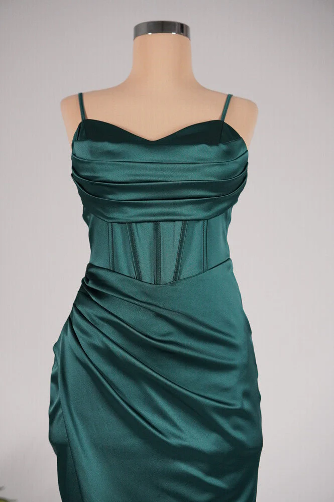 Bella satin corset slit gown featuring slim straps, a corset-style bodice and thigh-high slit. Gentle ruching defines the waist while stretch and a light drape contour the body without showing folds. Composition: Cotton, Polyester, Elastane, Satin.