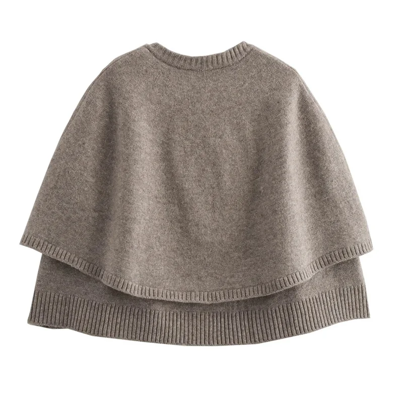 Blake Wool-Blend Button-Up Cape Sweater featuring a layered cape design, front button fastening and ribbed hem. Soft wool-blend knit with a relaxed drape that layers over blouses, sweaters or dresses for warm, feminine elegance in cooler months.