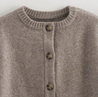 Blake Wool-Blend Button-Up Cape Sweater featuring a layered cape design, front button fastening and ribbed hem. Soft wool-blend knit with a relaxed drape that layers over blouses, sweaters or dresses for warm, feminine elegance in cooler months.