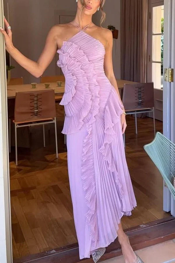 Catherine Ruffle Dress: long asymmetric gown with delicate halter straps, sculpting bodice and cascading pleated ruffles; lightweight chiffon-like polyester with subtle sheen and fluid motion, delivered with a free pearl clutch bag.