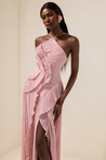 Catherine Ruffle Dress: long asymmetric gown with delicate halter straps, sculpting bodice and cascading pleated ruffles; lightweight chiffon-like polyester with subtle sheen and fluid motion, delivered with a free pearl clutch bag.