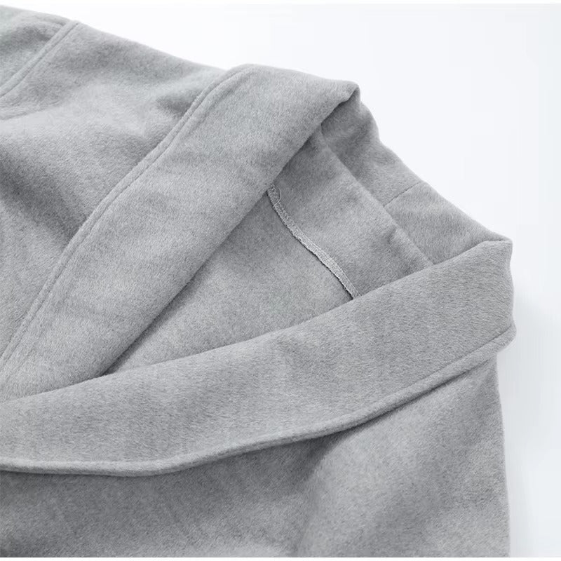 Celine wool-blend belted coat featuring a wrap front, wide lapels and waist-defining tie belt with statement faux fur cuffs. Soft, warm and durable outer layer that elevates autumn-winter outfits from tailored trousers to knit dresses with Parisian elegance.