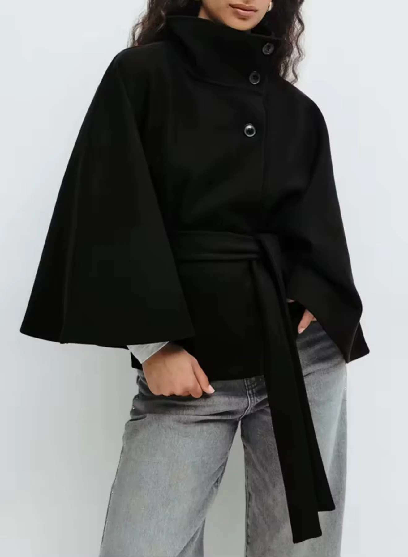 Chloe 2-Pack Cape Bundle featuring two belted capes with high-neck collars, buttoned fronts and detachable waist ties. Soft-touch fabric, flowing drape and versatile colors ideal for layering over dresses, denim or tailored looks.