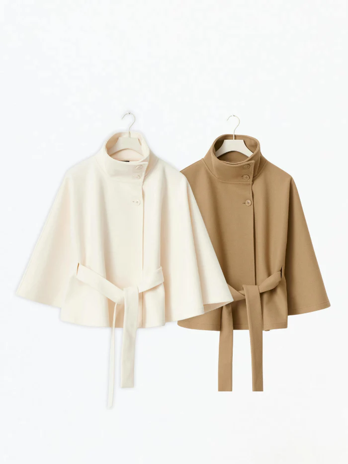 Chloe 2-Pack Cape Bundle featuring two belted capes with high-neck collars, buttoned fronts and detachable waist ties. Soft-touch fabric, flowing drape and versatile colors ideal for layering over dresses, denim or tailored looks.