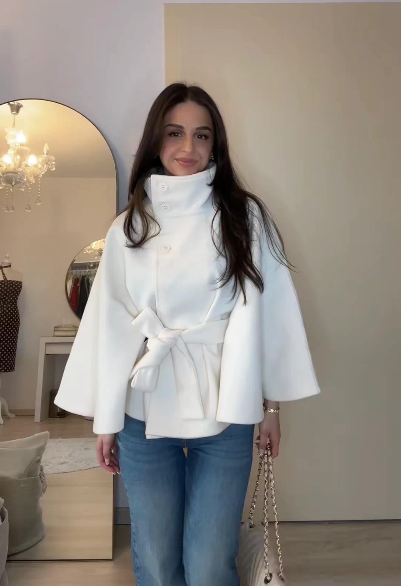 Chloe 2-Pack Cape Bundle featuring two belted capes with high-neck collars, buttoned fronts and detachable waist ties. Soft-touch fabric, flowing drape and versatile colors ideal for layering over dresses, denim or tailored looks.