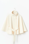 Chloe 2-Pack Cape Bundle featuring two belted capes with high-neck collars, buttoned fronts and detachable waist ties. Soft-touch fabric, flowing drape and versatile colors ideal for layering over dresses, denim or tailored looks.