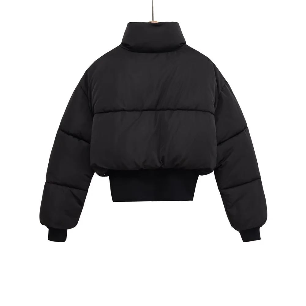 Claire cropped puffer jacket in black, featuring a high padded collar, zip fastening, elasticated cuffs and a smooth polyester shell with lightweight fibre filling. Sleek, warm and non-bulky—ideal over high-waist denim, skirts or tailored trousers.