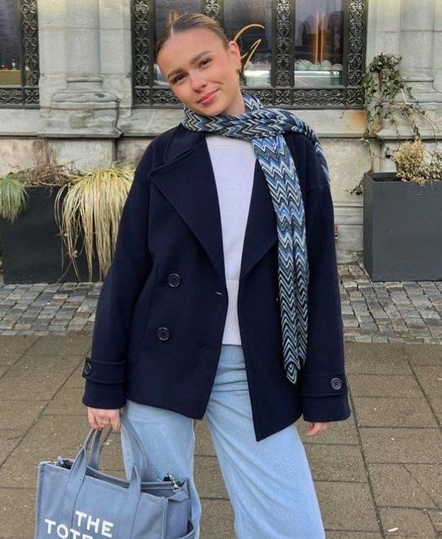 Maya wool-blend double-breasted cropped trench coat in a tailored silhouette with wide lapels and structured shoulders. Warm, durable and comfortable layer for autumn and winter, styled with denim, skirts or trousers.