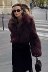 Adele faux fur oversized coat in plush synthetic fibres with wide lapel collar, concealed front and relaxed silhouette. Warm, durable and cruelty-free outerwear that layers over jeans, dresses and evening looks for chic winter style.