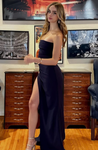 Elizabeth strapless slit maxi dress featuring side ruching that defines the waist, a fluid, crease-resistant drape and a refined side slit for easy movement. Stretch fabric molds to the body for a sculpted look. Composition: Polyester, Elastane.