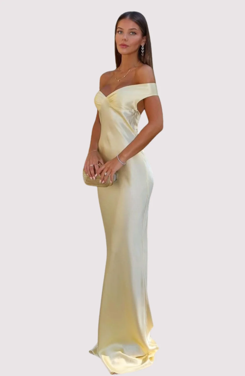 Emory satin backless maxi dress featuring an off-shoulder band, soft twist at the bust, and a sleek, body-skimming silhouette that falls to the floor. Lightweight satin with a refined sheen—ideal for weddings, formal dinners, and elegant evening events.
