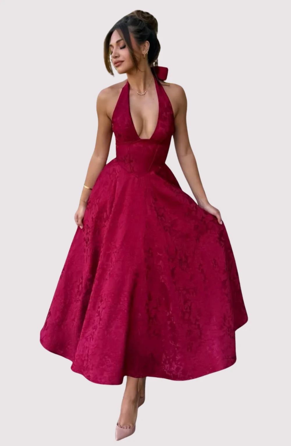 Esmeralda halter sleeveless midi dress featuring a deep V neckline, corset-inspired waist and full A-line skirt. Floral textured fabric adds shine and dimension; mid-calf length keeps movement graceful—perfect for weddings, parties and chic daylight events.