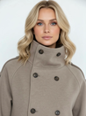 Evie high-neck wool-blend jacket featuring a structured tall collar, double-breasted button closure, adjustable cuffs and a slightly cropped silhouette. Soft, insulating fabric and clean lines for versatile layering with jeans, skirts or tailored trousers.