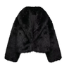Women’s faux-fur coat in a plush, black finish featuring a wide lapel and a relaxed, waist-skimming silhouette. Soft, cosy texture adds refined warmth and layers effortlessly over dresses, denim or tailored looks for day-to-night elegance.