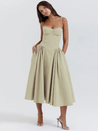 Women’s waist-shaper midi sundress with bustier cups, slender straps and a full, swingy skirt with side pockets. Contoured waist seam creates an hourglass effect; smooth, lightweight finish suits brunches, parties and summer evenings.