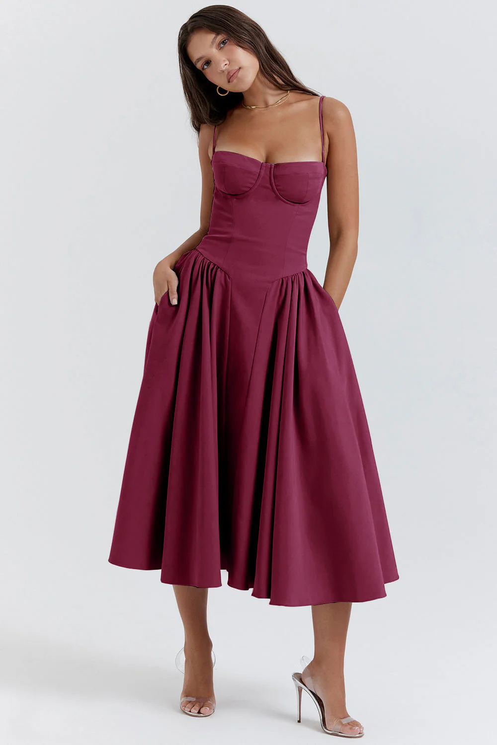 Women’s waist-shaper midi sundress with bustier cups, slender straps and a full, swingy skirt with side pockets. Contoured waist seam creates an hourglass effect; smooth, lightweight finish suits brunches, parties and summer evenings.