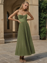 Women’s bustier sleeveless midi dress with a sweetheart neckline, contoured cups, tulle overlay, and an all-over pleated fit-and-flare skirt. Elegant, versatile piece for chic occasions, styled with heels or flats for polished looks.