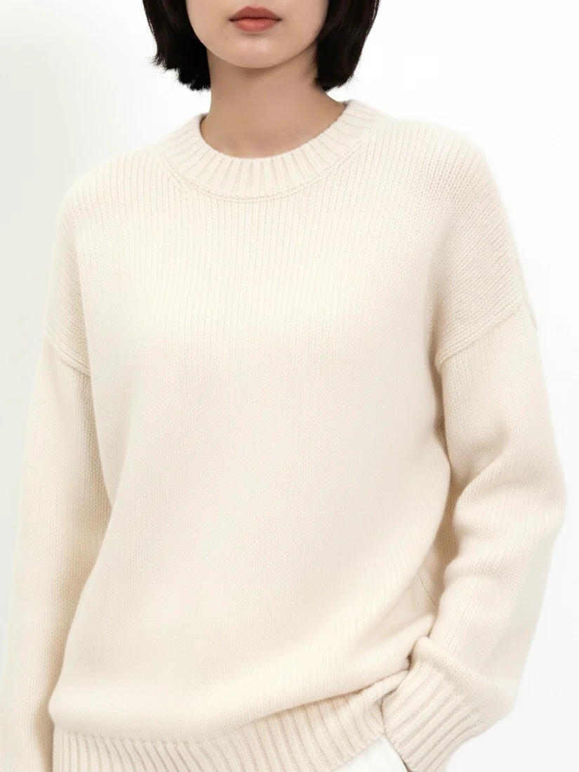 Hazel Beige Wool-Blend Oversized Knit Sweater with relaxed silhouette, soft wool blend and warm beige tone. Features slightly dropped shoulders plus ribbed cuffs and hem. Effortless layering over jeans, tailoring or dresses for refined cold-season style.