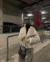 Women’s faux-fur coat in off-white with a softly structured collar and feminine, slim silhouette. High-quality build provides warm yet breathable comfort for Autumn/Winter. Versatile design pairs with denim, tailoring or evening dresses; also in Beige or White.