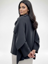 Women’s oversized warm coat featuring a draped, fold-over neckline, relaxed cocoon silhouette and asymmetric hem. Soft-touch construction adds cosy warmth without bulk, layering smoothly over knitwear, dresses or tailoring for refined everyday style.