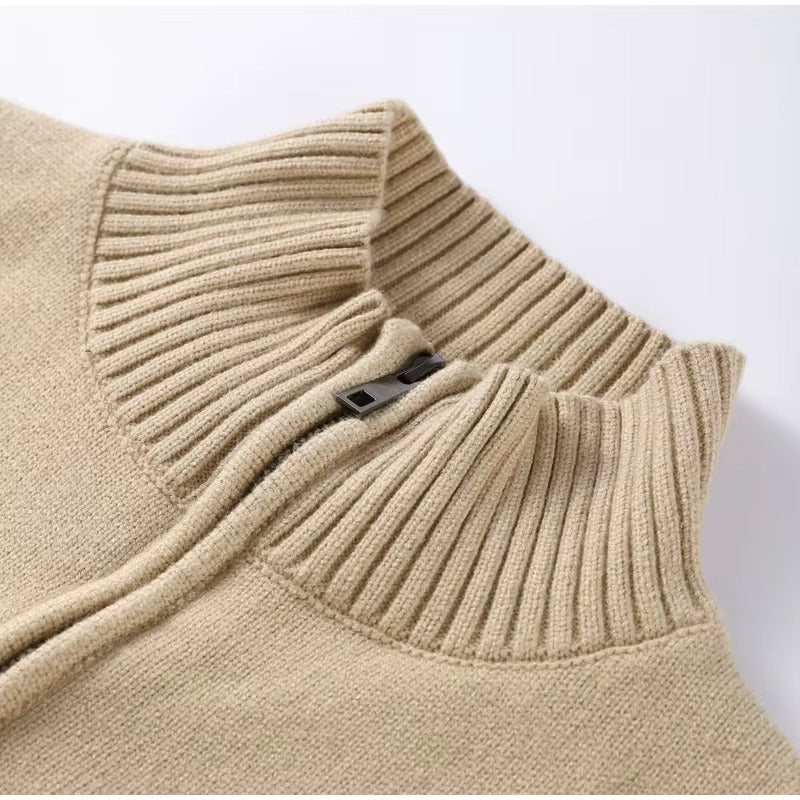 Women’s zip-up knit cardigan with high ribbed collar, full front zipper, and ribbed cuffs and hem. Soft stretch knit and a gently cropped, waist-skimming fit make it perfect for layering under coats or pairing with denim and tailored pants.