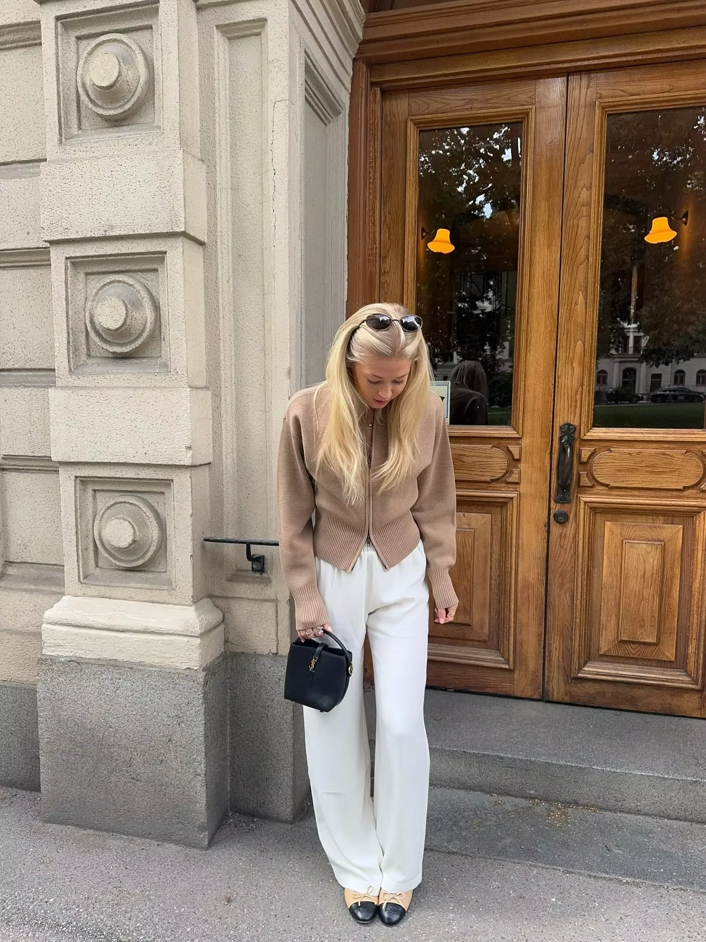 Women’s zip-up knit cardigan with high ribbed collar, full front zipper, and ribbed cuffs and hem. Soft stretch knit and a gently cropped, waist-skimming fit make it perfect for layering under coats or pairing with denim and tailored pants.