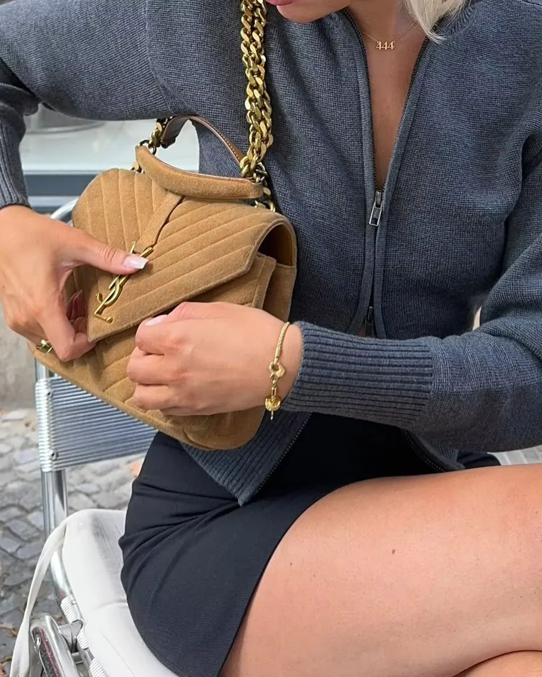 Women’s zip-up knit cardigan with high ribbed collar, full front zipper, and ribbed cuffs and hem. Soft stretch knit and a gently cropped, waist-skimming fit make it perfect for layering under coats or pairing with denim and tailored pants.