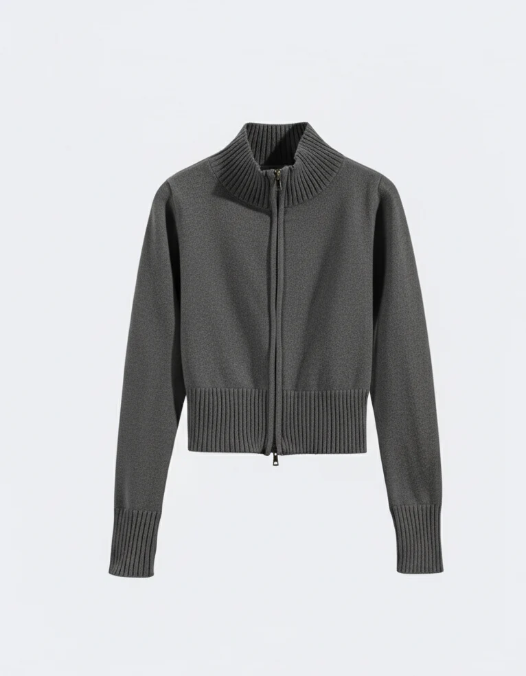 Women’s zip-up knit cardigan with high ribbed collar, full front zipper, and ribbed cuffs and hem. Soft stretch knit and a gently cropped, waist-skimming fit make it perfect for layering under coats or pairing with denim and tailored pants.