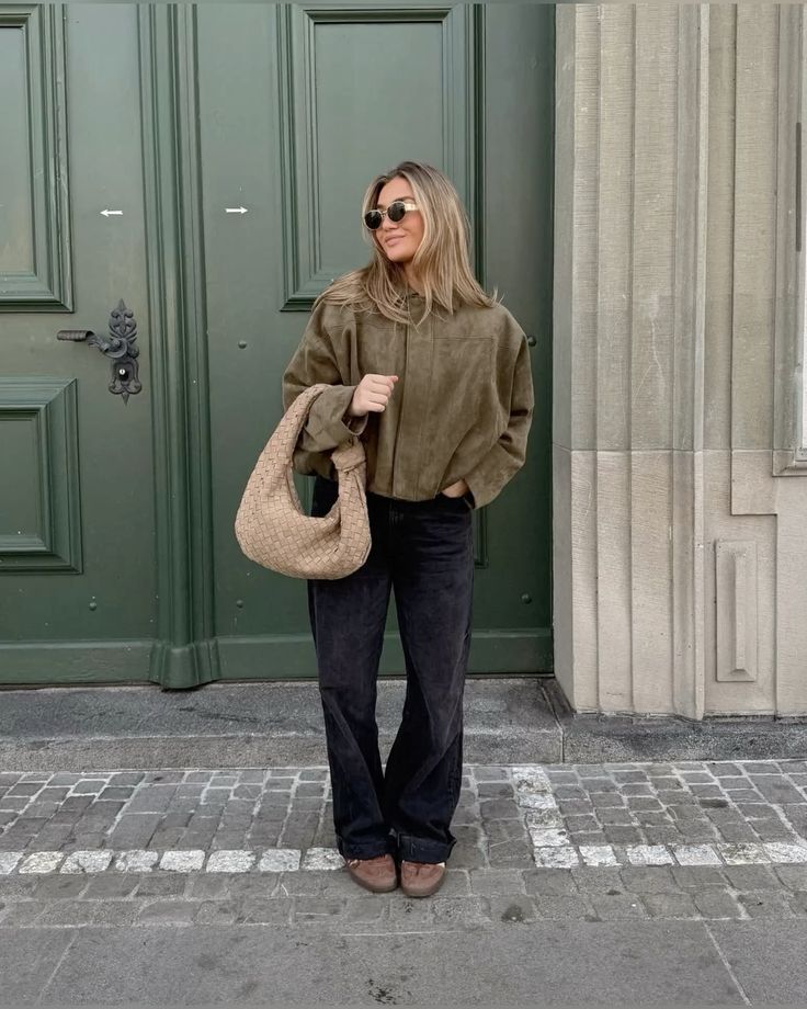 Suede-textured pilot jacket featuring a relaxed silhouette with batwing sleeves, clean front fastening and paneled construction. Medium-weight feel adds warmth without bulk, creating an effortless layer over tees, knits or dresses for city-ready style.